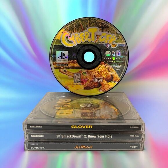 Lot 4 PlayStation Video Games Cyber Tiger, Glover, WWF Smack Down 2, Jet Moto 2 - Picture 1 of 11